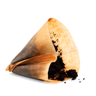 Coffee grounds in a used coffee filter